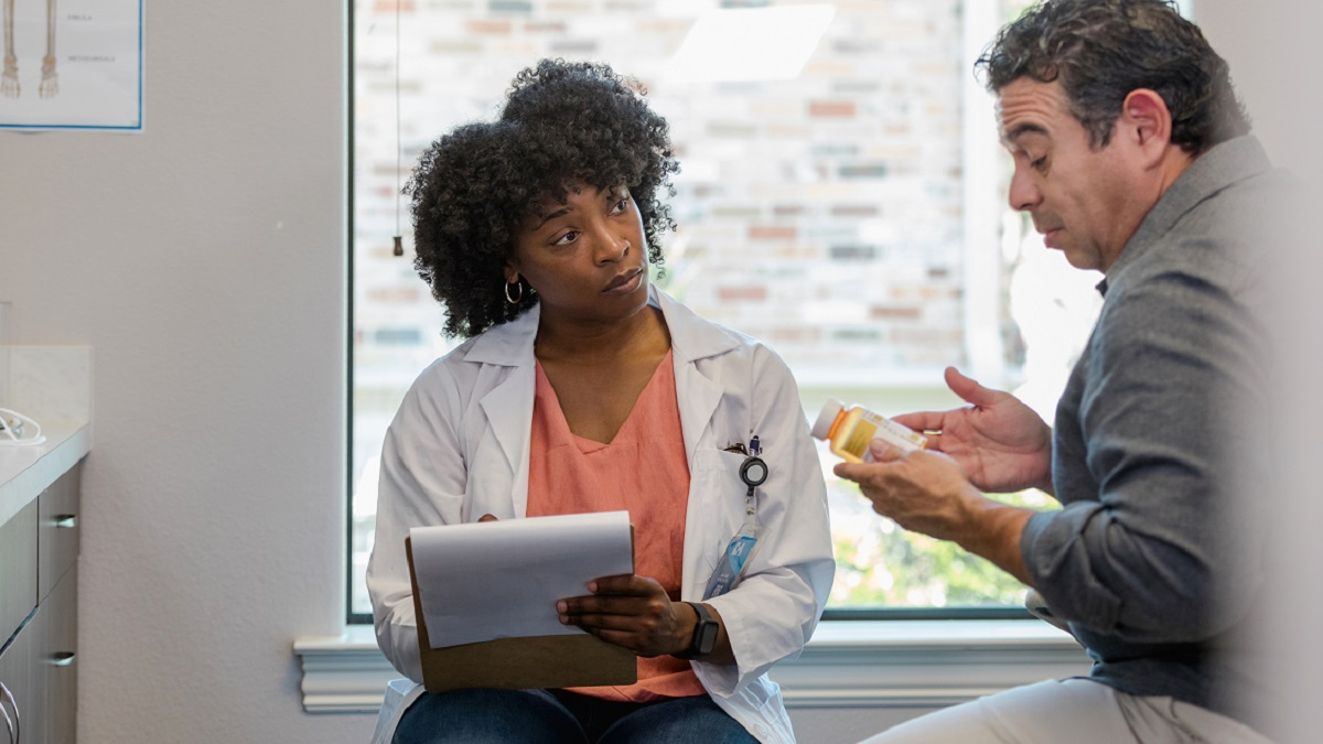 Doctor talking to patient