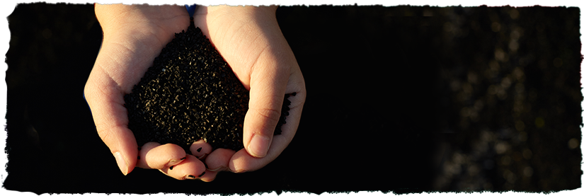 Hands holding tire crumb