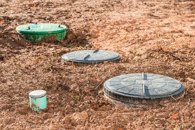 In-ground wastewater treatment system in soil